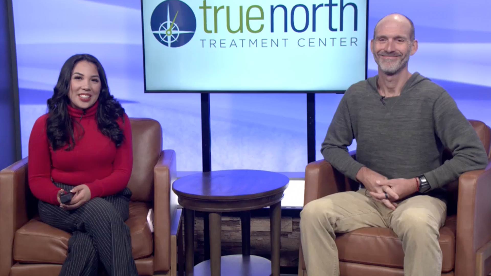 Dave Briggs speaking at the Reno News Fox 11 studio for a Therapy Thursday discussion