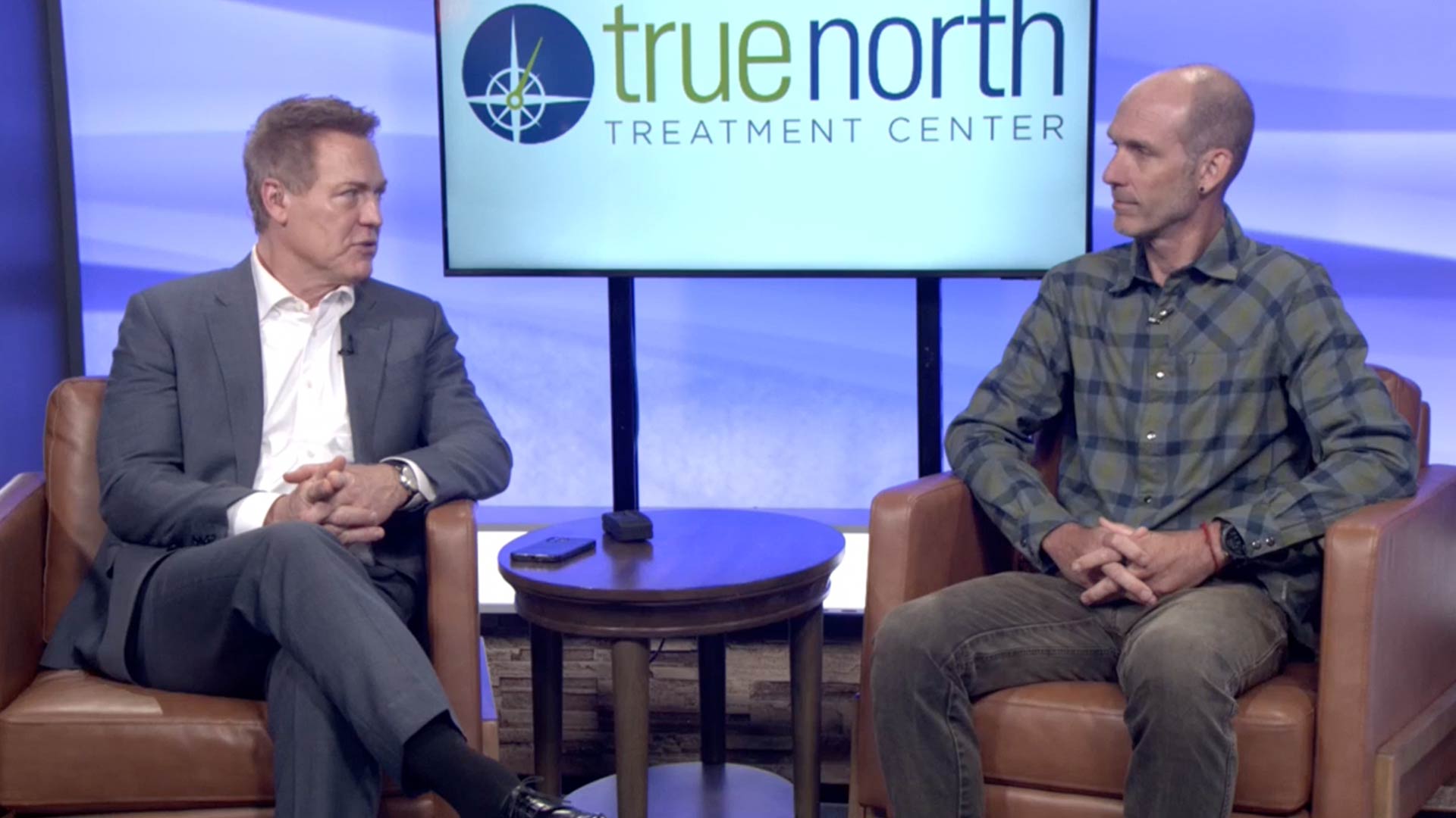 Dave Briggs speaking at the Reno News Fox 11 studio for a Therapy Thursday discussion