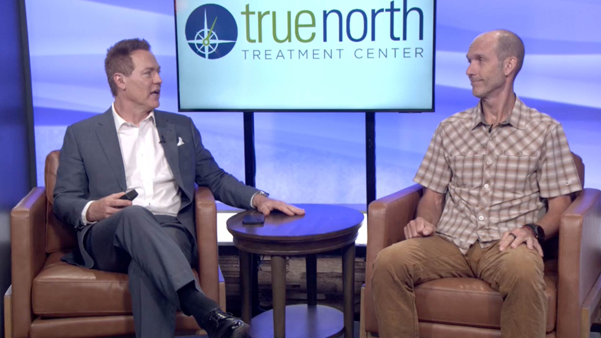 Dave Briggs speaking at the Reno News Fox 11 studio for a Therapy Thursday discussion