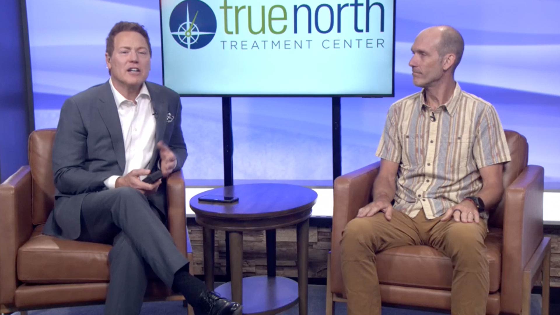 Dave Briggs speaking at the Reno News Fox 11 studio for a Therapy Thursday discussion