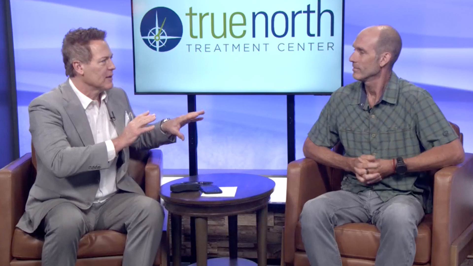 Dave Briggs speaking at the Reno News Fox 11 studio for a Therapy Thursday discussion