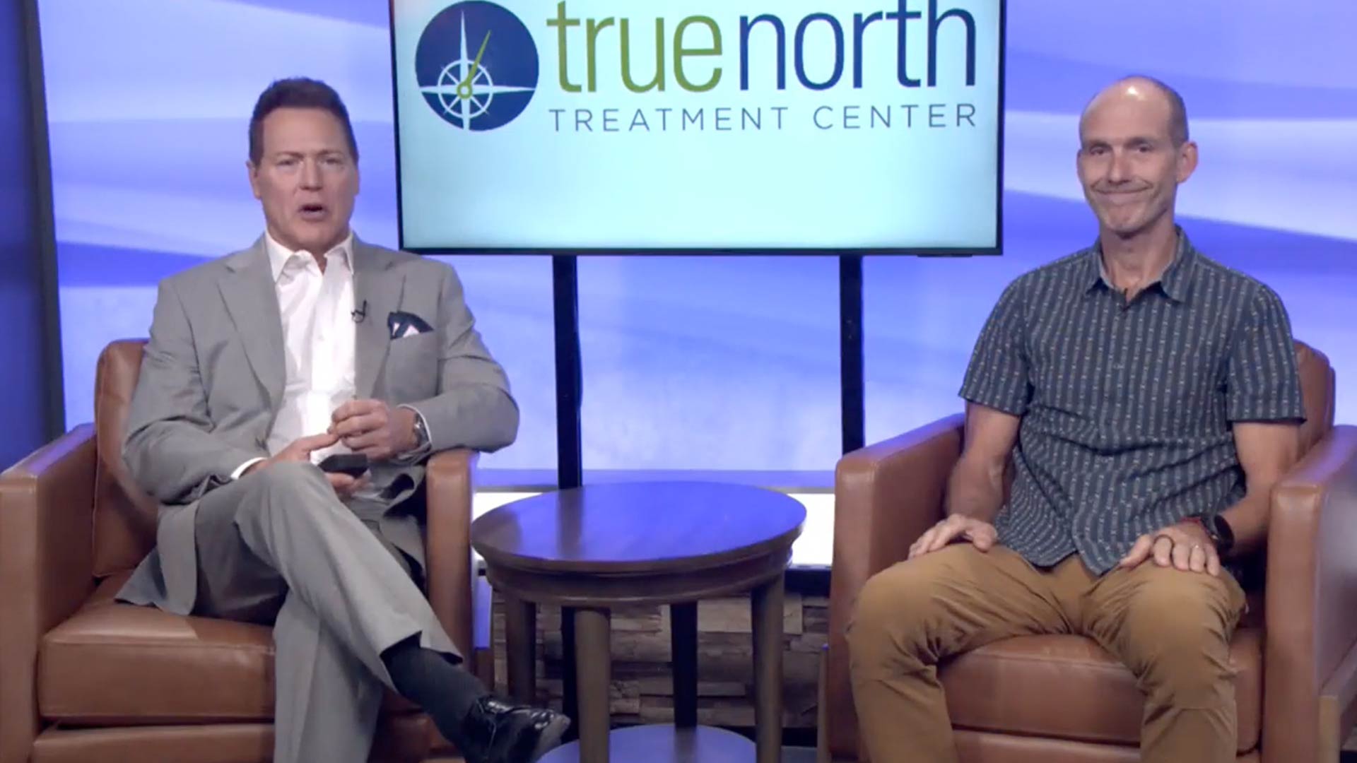 Dave Briggs speaking at the Reno News Fox 11 studio for a Therapy Thursday discussion