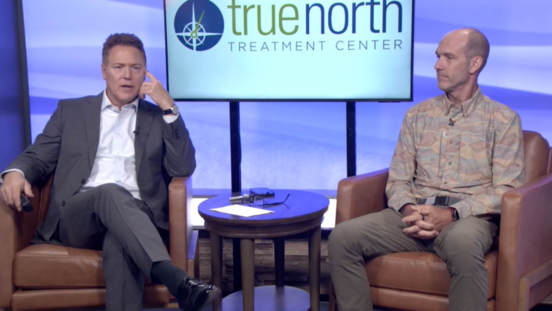 Dave Briggs speaking at the Reno News Fox 11 studio for a Therapy Thursday discussion