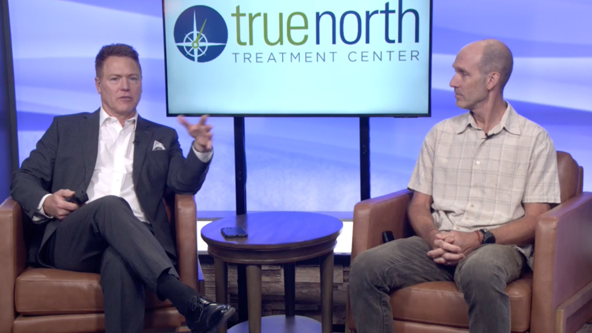 Dave Briggs speaking at the Reno News Fox 11 studio for a Therapy Thursday discussion